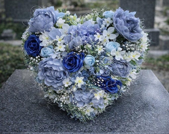Heart-Shaped Blue Memorial Wreath: An elegant tribute for gravesites. Customizable colors available. Perfect for outdoor remembrance.