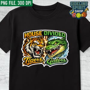 May include: Black t-shirt with a graphic of a tiger and alligator facing each other, with the text "HOUSE DIVIDED". The tiger is orange and white, and the alligator is green. The shirt also has the words "Tigers" and "Gators".