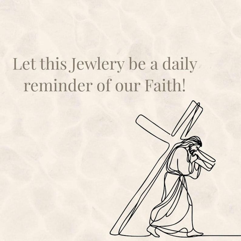 May include: A line drawing depicts a figure carrying a cross, with the text "Let this Jewlery be a daily reminder of our Faith!" in a light brown font. The background is a light beige color.
