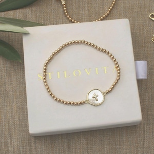 Armband med guldfyllt kors • Fri snabb frakt • Present till henne • Stretchig design • Handgjort i USA