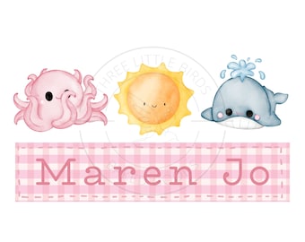 May include: A pink octopus, a yellow sun, and a blue whale with a water spout are arranged across a pink and white gingham ribbon with the name "Maren Jo" printed on it.