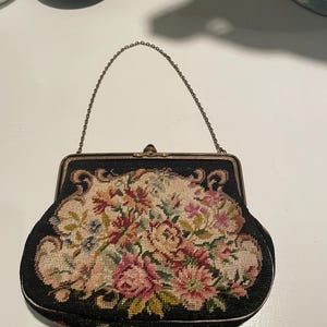 Early 1930’s evening bag, Made in Austria.  Black needlepoint petit point.  In excellent condition.