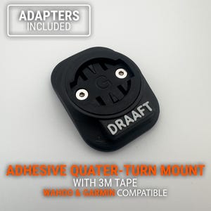 May include: Black adhesive quarter-turn mount for a bicycle computer, compatible with Wahoo and Garmin devices. The mount includes 3M tape for easy attachment and is labeled "DRAAFT". The text "ADAPTERS INCLUDED" is also visible.