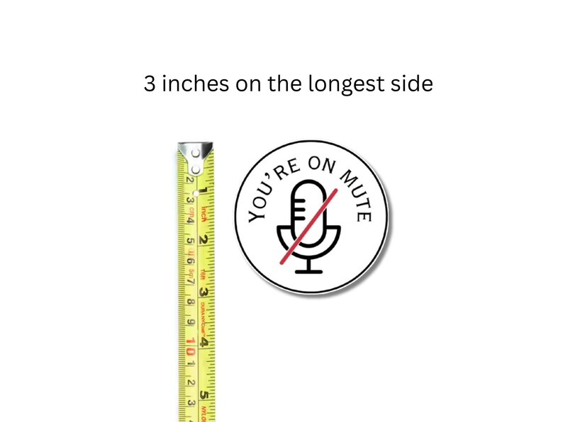 May include: A round sticker with the text "YOU'RE ON MUTE" and a microphone icon with a red line through it. The sticker is approximately 3 inches (7.6 cm) in diameter. A yellow measuring tape is next to the sticker.