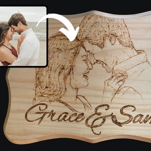 May include: A wood plaque with a woodburned image of a couple embracing. The couple's names, "Grace & Sam", are written below the image.