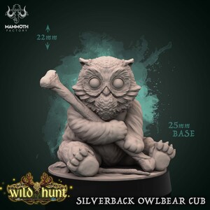 May include: A detailed, gray Silverback Owlbear Cub figurine, holding a bone. The figurine is on a 25mm base and is 22mm tall. The Mammoth Factory and Wild Hunt logos are visible. The figurine has large, round eyes and a textured surface.