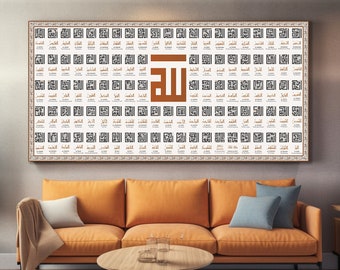May include: Large framed artwork featuring Arabic calligraphy in black and brown. The artwork is displayed above an orange sofa with blue and white pillows. A small Christmas tree and wooden furniture complete the living room setting.