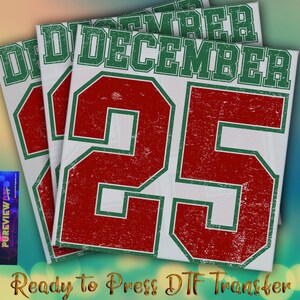 May include: Three white rectangular DTF transfer sheets with a distressed design. Each sheet displays "DECEMBER 25" in red and green. The phrase "Ready to Press DTF Transfer" is at the bottom. A colorful logo is on the left.