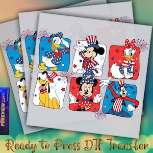 May include: DTF transfers featuring Disney characters in patriotic outfits. Donald Duck, Mickey Mouse, Minnie Mouse, Daisy Duck, Pluto, and Goofy are depicted in red, white, and blue designs. The text "Ready to Press DTF Transfer" is visible.