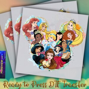 May include: A stack of three gray canvases featuring a colorful illustration of Disney princesses arranged in a heart shape. The princesses include Ariel, Belle, and Jasmine. The text "Ready to Press DTF Transfer" is at the bottom.