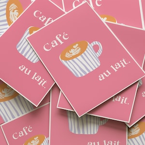 May include: Pink cards with a coffee theme. Each card features a coffee cup illustration with a latte art design and the words "Café au lait." The cup has blue and white stripes.