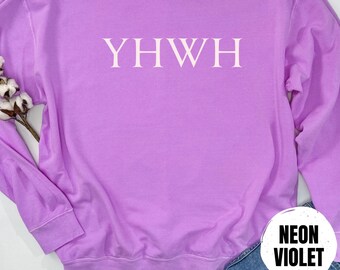 May include: A purple sweatshirt with the word "YHWH" printed in white on the front. The sweatshirt is made of a soft, comfortable material and has a relaxed fit.