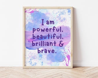 May include: A motivational quote, "I am powerful, beautiful, brilliant & brave." is printed in purple text on a white background with watercolor splashes of pink, purple, and blue.