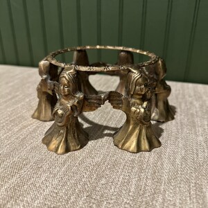 Vintage round brass Angel stand