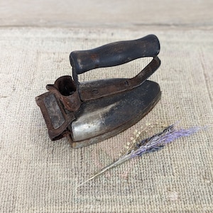 Vintage cast iron clothing iron