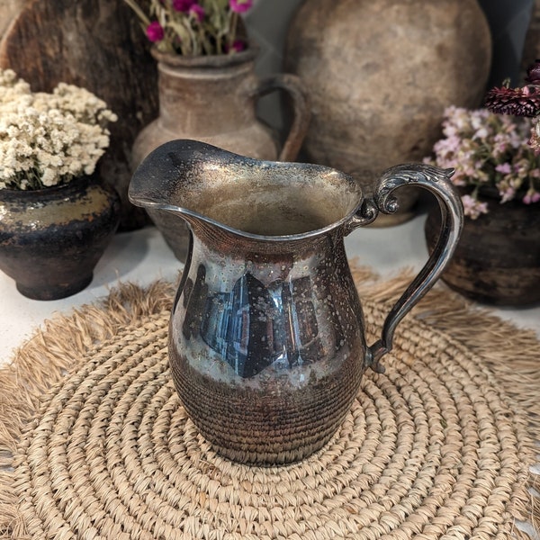 Antique silver pitcher