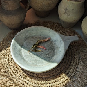 Large vintage stone bowl with handle