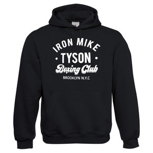 May include: Black hooded sweatshirt with a white graphic print that reads "Iron Mike Tyson Boxing Club Brooklyn N.Y.C."