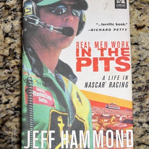 First Edition First Printing Hardcover – Real Men Work in the Pits by Jeff Hammond (Signed)