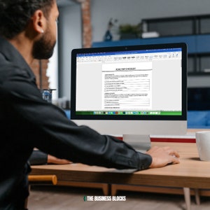 May include: A person is looking at a computer screen displaying a road trip checklist. The checklist includes items such as vehicle maintenance, packing essentials, and travel documents.