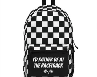 May include: Black and white checkered backpack with a black pocket that says "I'd rather be at the racetrack" with two white checkered flags.