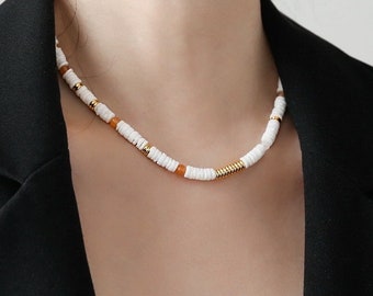 Handcrafted White Shell Necklace: Red Agate & Gold Accents