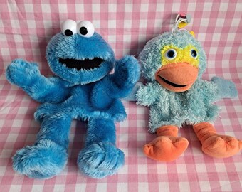 Sesame Street hand puppets Pino and Cookie Monster