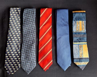 Various silk ties including Bijenkorf and Chagal