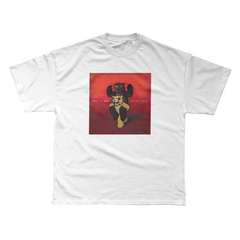 a white t - shirt with a picture of a bear on it
