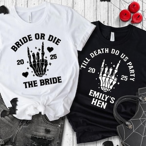 May include: Two t-shirts with Halloween-themed graphics. One white shirt says "BRIDE OR DIE" with a skeleton hand, hearts, and the numbers "20" and "25". The other black shirt says "TILL DEATH DO US PARTY" with a skeleton hand and the numbers "20" and "25".