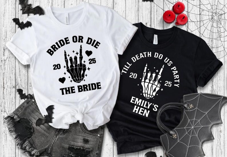 May include: Two t-shirts with Halloween-themed graphics. One white shirt says "BRIDE OR DIE" with a skeleton hand, hearts, and the numbers "20" and "25". The other black shirt says "TILL DEATH DO US PARTY" with a skeleton hand and the numbers "20" and "25".