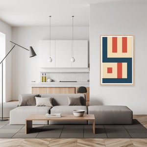May include: A minimalist living room with a light grey sectional sofa, a wooden coffee table, and a framed abstract geometric print with red, orange, and blue shapes on a beige background.