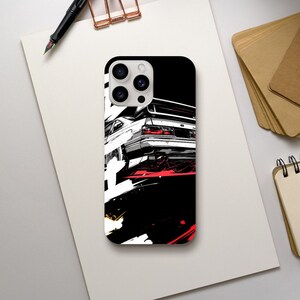 May include: A black and white phone case with a white car illustration and red accents. The car is a Japanese sports car with a rear spoiler and a black background. The phone case has a camera cutout with four lenses.