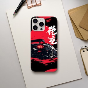 May include: Black and red phone case with a Japanese character and a black sports car with red taillights.