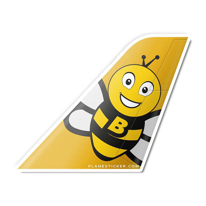 May include: A yellow aircraft tail fin featuring a cartoon bee wearing a black and yellow striped suit with a black letter "B" on its chest. The bee has a smiling face with large eyes. The tail fin is labelled "PLANESTICKER.COM".