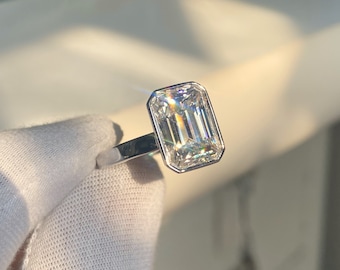 Emerald Cut Moissanite Engagement Ring: 4ct D VVS Solitaire Bezel Set