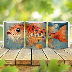 May include: Three white ceramic mugs with a colorful fish design. The fish is orange, red, and white with black spots. The mugs are on a wooden surface.