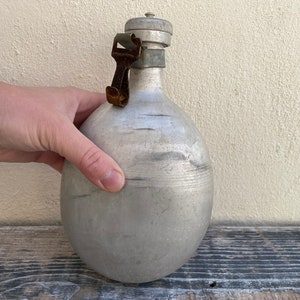 Оld aluminum drinking flask (1 liter). Water canteen