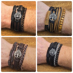 May include: Four leather bracelets with a tree of life charm. The bracelets are in shades of brown, black, and tan, with various textures including braided, beaded, and wrapped designs. The charms are silver-toned.