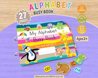 Könnte beinhalten: Ein buntes Alphabet-Beschäftigungsbuch mit 27 Seiten und einem gestreiften Einband, der mit einem Pinguin, einer Giraffe und einem Affen illustriert ist. Das Buch enthält Metallringe, alphabetische Registerkarten sowie Bären- und Froschmotive.