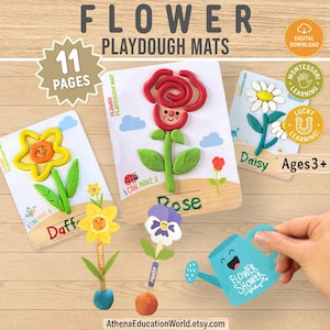 Può includere: Un set di 11 pagine di tappetini per pongo a tema floreale con illustrazioni di una rosa, una margherita, un narciso e una viola. I tappetini includono etichette di testo e faccine sorridenti sui fiori. È incluso un annaffiatoio blu.