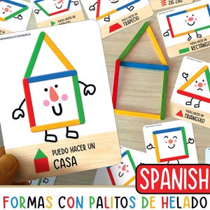 Puede incluir: Un conjunto de tarjetas de memoria coloridas en español para aprender formas. Cada tarjeta presenta una forma diferente hecha con palitos de helado y un personaje de dibujos animados con una cara. Las tarjetas incluyen las palabras "PUEDO HACER UN" (Puedo hacer un) y el nombre de la forma en español. Las tarjetas están etiquetadas "FORMAS CON PALITOS DE HELADO" (Formas con palitos de helado).