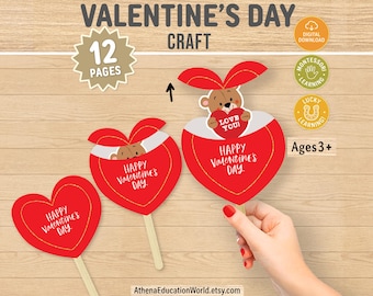 May include: A Valentine's Day craft set featuring 12 pages of printable heart-shaped cards. The cards are red with gold outlines and text that reads Happy Valentine's Day. Some cards feature a pop-up teddy bear holding a heart with Love You.