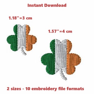 Può includere: Due disegni di trifoglio ricamati in verde, bianco e arancione, che rappresentano la bandiera irlandese. I trifogli misurano 3 cm e 4 cm.