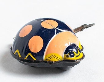 Vintage Wind-Up Ladybug Tin Toy TPS 1950