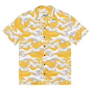 May include: Yellow button-down shirt with a repeating wave pattern in white and gray. The short-sleeved shirt has a classic collar and black buttons. The shirt's design is inspired by Japanese art.