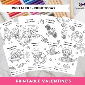 May include: Printable coloring cards featuring space-themed illustrations and Valentine's Day messages. The cards include astronauts, rockets, planets, stars, and a spaceship. The text on the cards includes phrases like "Will you be my lucky star?" and "You're out of this world."