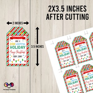 May include: Printable Christmas gift tags with a red and green striped background and a string of colorful lights. The tags read "Have a DOH Lightful Holiday! Merry Christmas! From Sonny". The tags are 2 inches wide and 3.5 inches tall.
