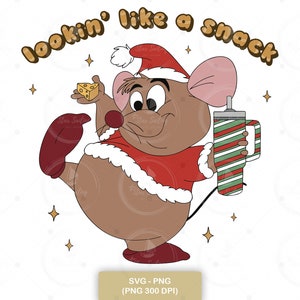May include: A cartoon mouse wearing a Santa hat and red and white outfit holds a cup with a striped pattern and a piece of cheese. The mouse is standing on one leg and has a playful expression. The text "lookin' like a snack" is written in a brown, rounded font above the mouse.