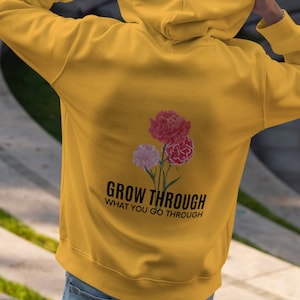 Cresci attraverso ciò che passi attraverso Felpa con cappuccio (Unisex)